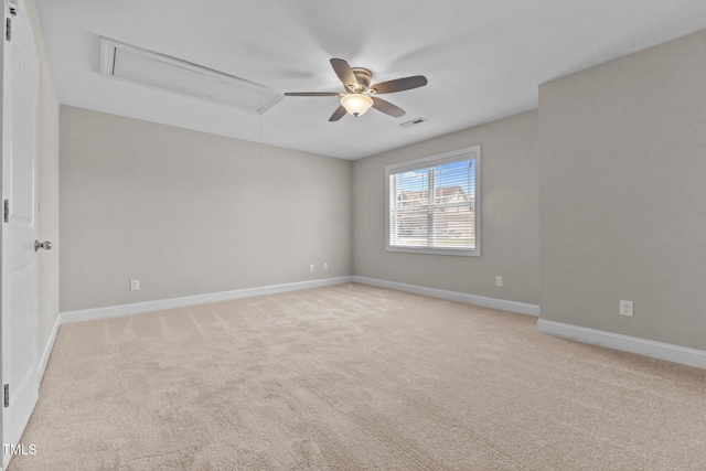 870 Kentucky Derby Ln, Lillington, NC 27546 - spare room with attic access, a ceiling fan, light carpet, and baseboards