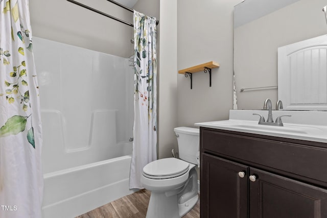 870 Kentucky Derby Ln, Lillington, NC 27546 - full bathroom featuring wood finished floors, toilet, vanity, and shower / bath combo