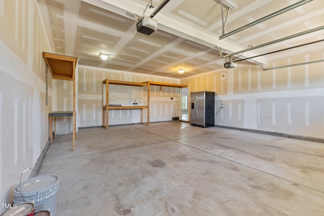 870 Kentucky Derby Ln, Lillington, NC 27546 - garage featuring stainless steel fridge with ice dispenser and a garage door opener