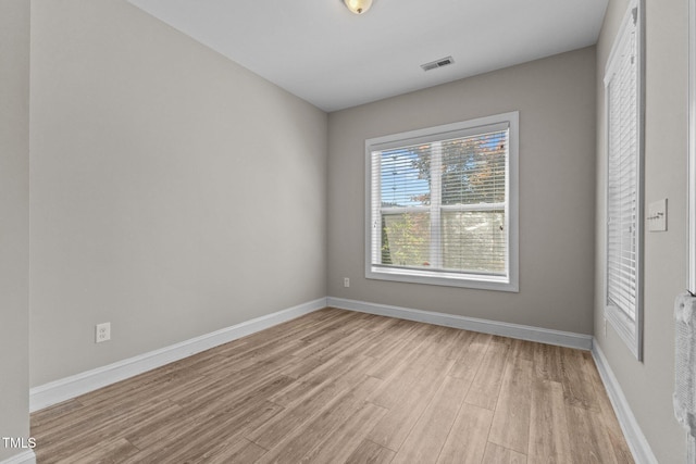 870 Kentucky Derby Ln, Lillington, NC 27546 - empty room with light wood-type flooring and baseboards