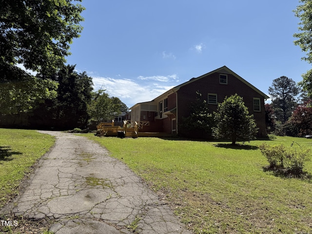 420 Rodwell St, Warrenton, NC 27589 - view of side of property with a yard
