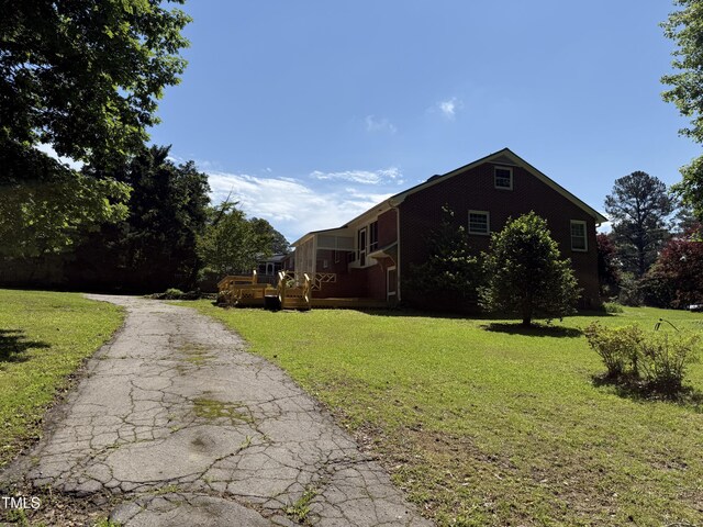 420 Rodwell St, Warrenton, NC 27589 - view of side of property with a yard