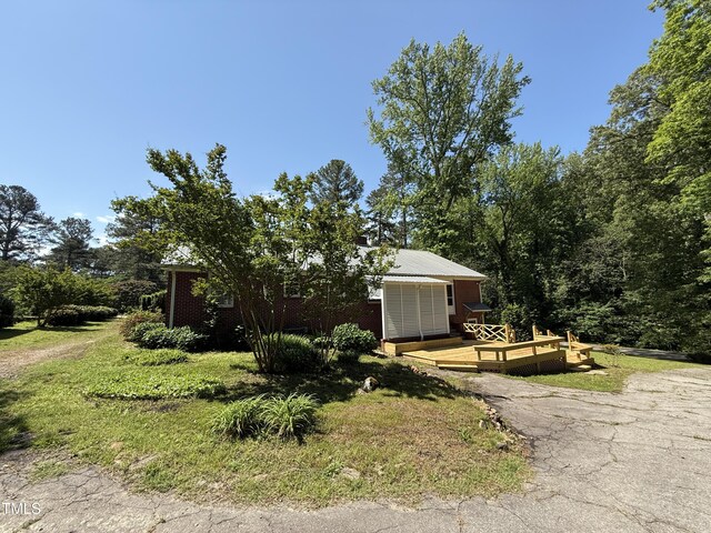 420 Rodwell St, Warrenton, NC 27589 - view of front facade featuring a deck