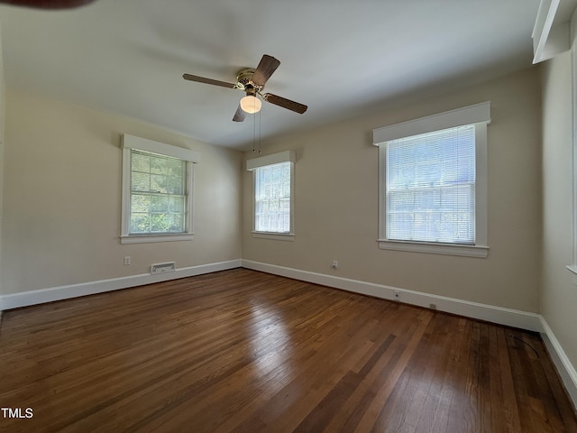 420 Rodwell St, Warrenton, NC 27589 - unfurnished room with wood-type flooring, a ceiling fan, and baseboards