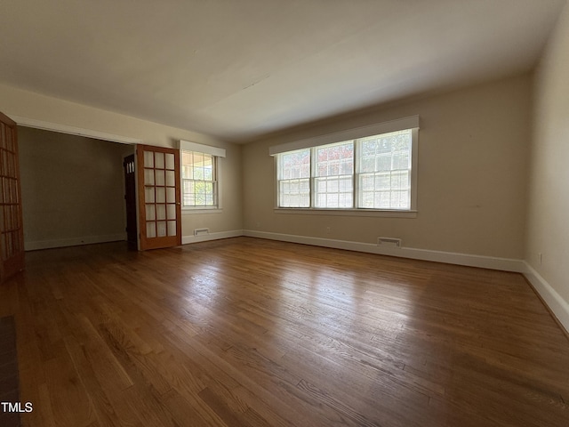 420 Rodwell St, Warrenton, NC 27589 - empty room featuring wood finished floors and baseboards