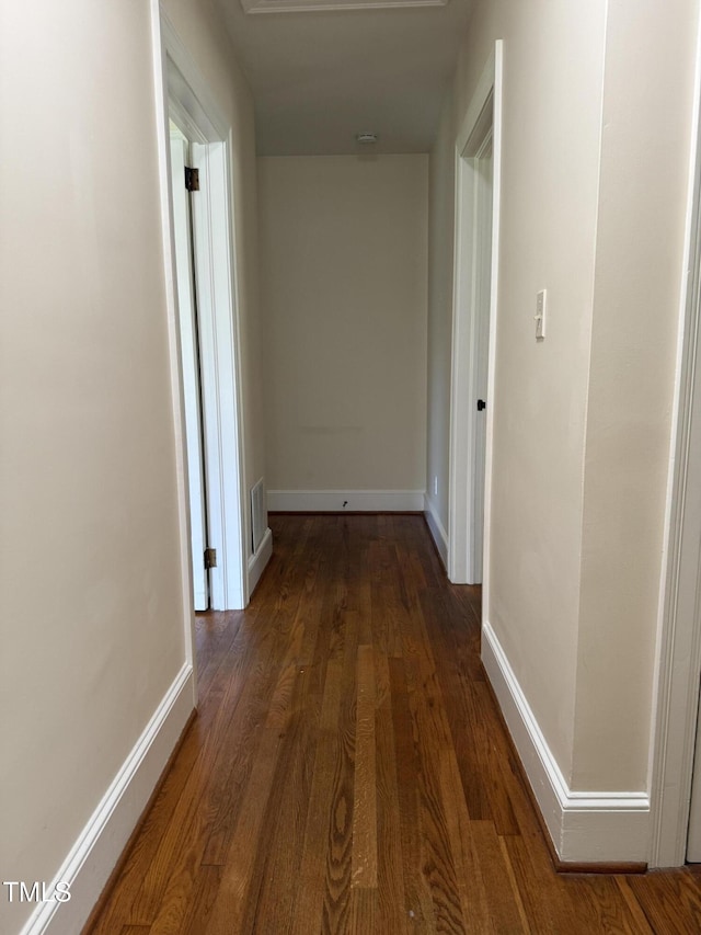 420 Rodwell St, Warrenton, NC 27589 - hallway with baseboards and dark wood-type flooring