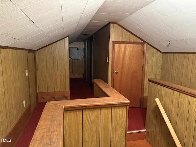 420 Rodwell St, Warrenton, NC 27589 - additional living space with lofted ceiling, wooden walls, and carpet
