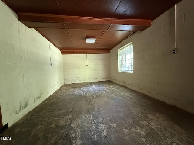 420 Rodwell St, Warrenton, NC 27589 - empty room with concrete flooring and concrete block wall