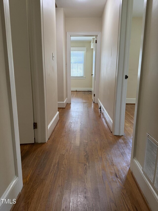420 Rodwell St, Warrenton, NC 27589 - hallway featuring wood finished floors and baseboards