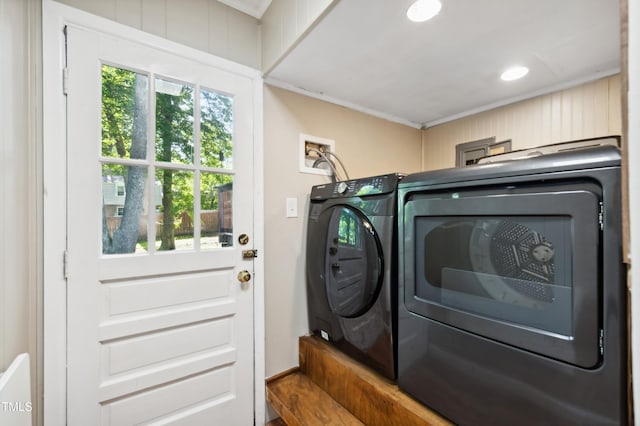 laundry area featuring washer and clothes dryer, crown molding, and recessed lighting