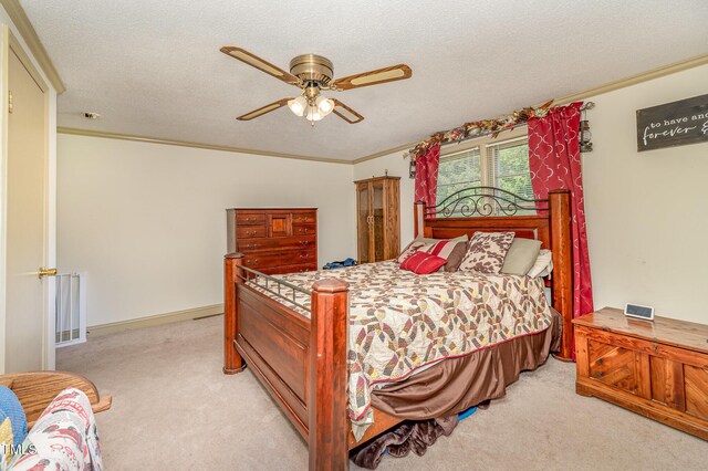 80 Lewis Moody Rd, Bear Creek, NC 27207 - bedroom with light colored carpet, crown molding, a textured ceiling, and a ceiling fan