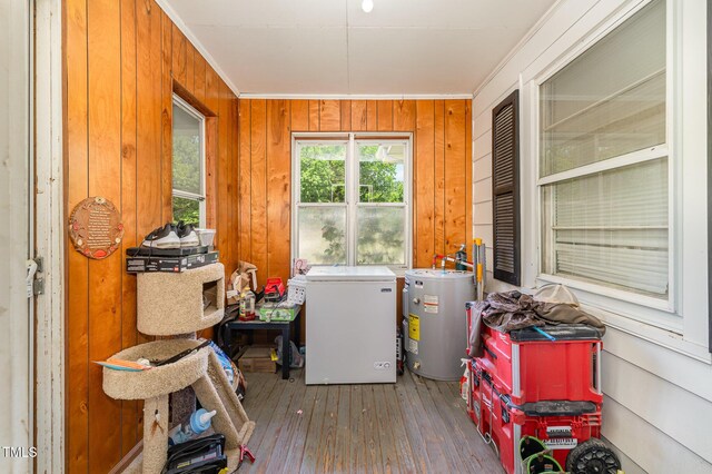 80 Lewis Moody Rd, Bear Creek, NC 27207 - laundry area featuring water heater, ornamental molding, hardwood / wood-style flooring, wooden walls, and independent washer and dryer