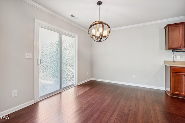 unfurnished dining area featuring a chandelier, dark wood-type flooring, ornamental molding, and baseboards