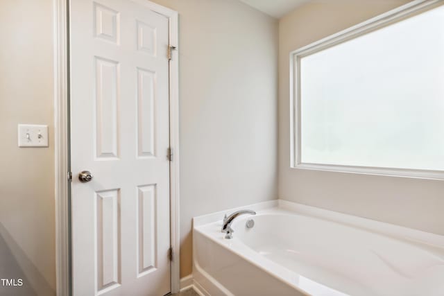 full bathroom with a bath