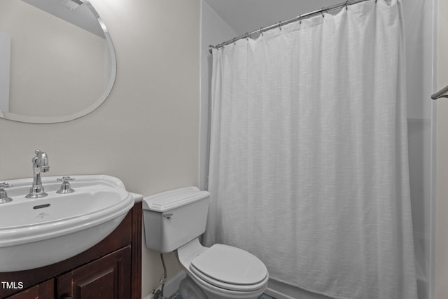 full bathroom with toilet, vanity, and a shower with curtain