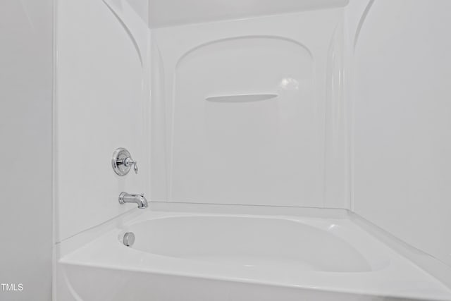 full bath featuring shower / tub combination