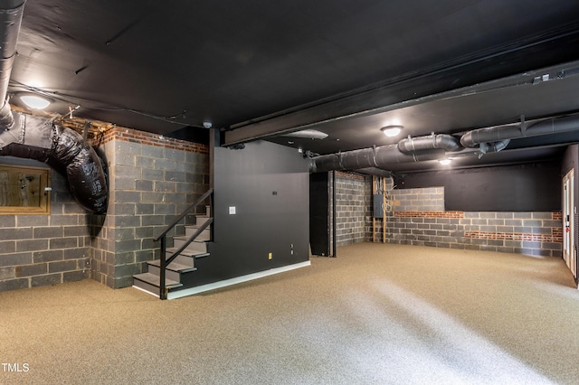 2617 Charenson Pl, Raleigh, NC 27614 - finished below grade area featuring carpet, stairway, and concrete block wall