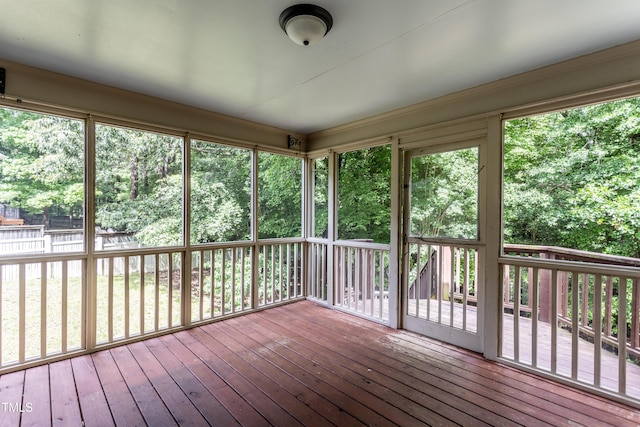 2617 Charenson Pl, Raleigh, NC 27614 - unfurnished sunroom with view of wooded area