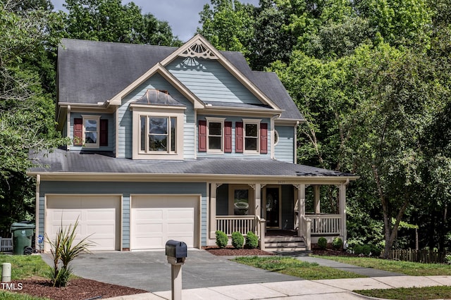 2617 Charenson Pl, Raleigh, NC 27614 - view of front of property with a porch, driveway, and a garage