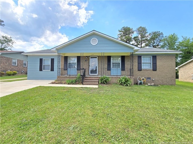 6841 Radial Dr, Fayetteville, NC 28311 - single story home with brick siding, covered porch, and a front lawn