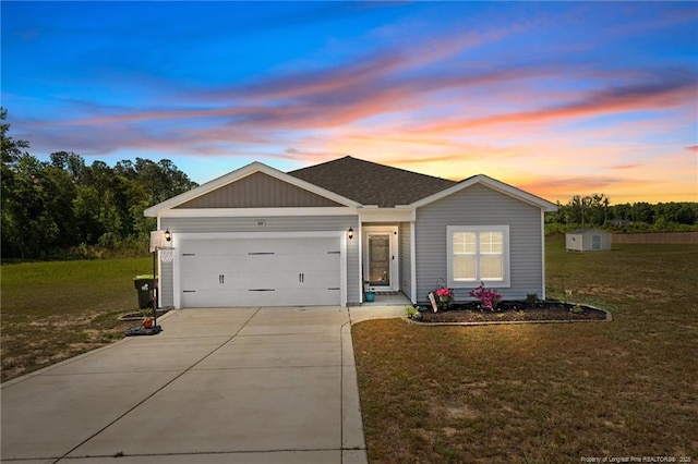 308 Laurel Lake Rd, Salemburg, NC 28385 - ranch-style house with driveway, an attached garage, and a front yard