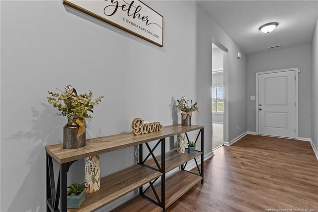 308 Laurel Lake Rd, Salemburg, NC 28385 - doorway to outside with wood finished floors and baseboards