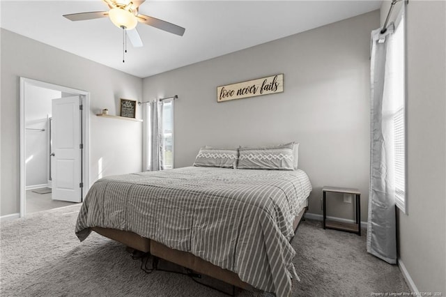 308 Laurel Lake Rd, Salemburg, NC 28385 - carpeted bedroom featuring baseboards and ceiling fan