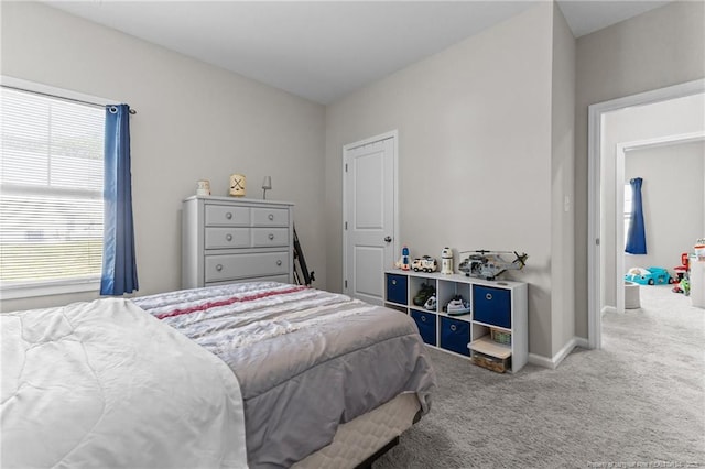 308 Laurel Lake Rd, Salemburg, NC 28385 - carpeted bedroom featuring baseboards
