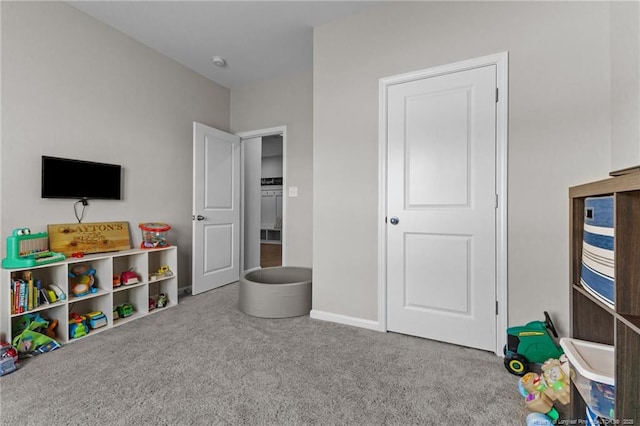 308 Laurel Lake Rd, Salemburg, NC 28385 - recreation room with carpet flooring and baseboards