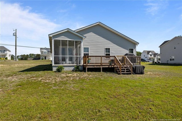 308 Laurel Lake Rd, Salemburg, NC 28385 - rear view of property with a sunroom, a lawn, and a wooden deck