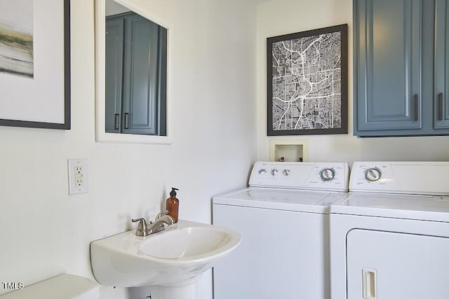 clothes washing area with independent washer and dryer