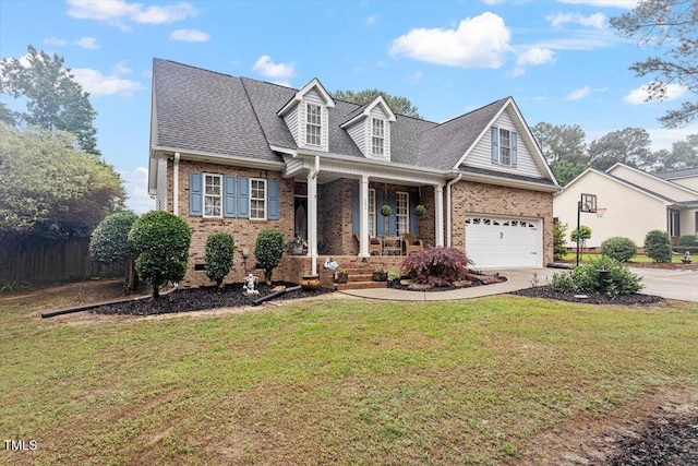 151 Donnibrook Run, Fuquay Varina, NC 27526 - new england style home featuring a porch, brick siding, concrete driveway, and a front yard