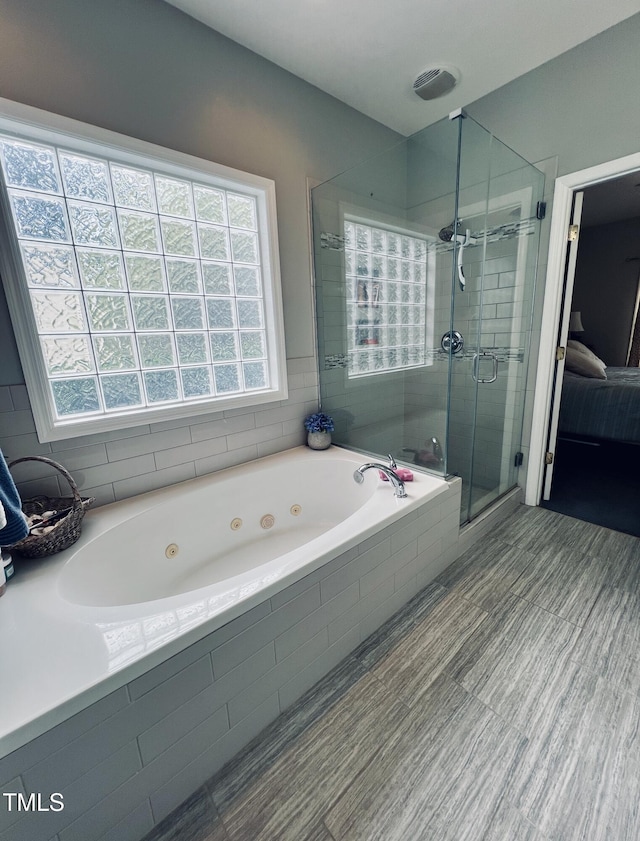 151 Donnibrook Run, Fuquay Varina, NC 27526 - full bathroom with a jetted tub and a stall shower