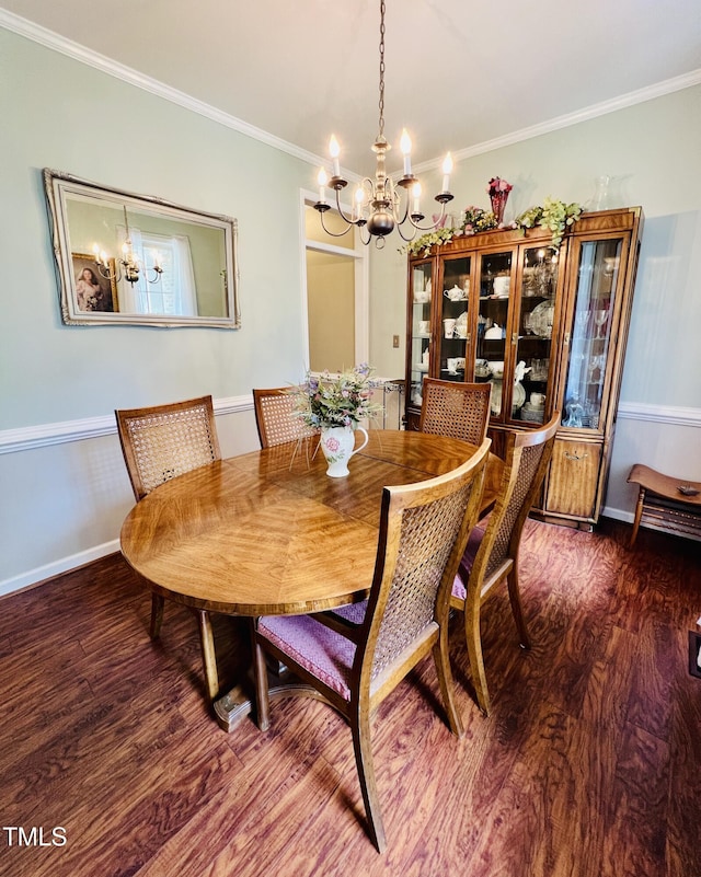 151 Donnibrook Run, Fuquay Varina, NC 27526 - dining room featuring a chandelier, wood finished floors, crown molding, and baseboards