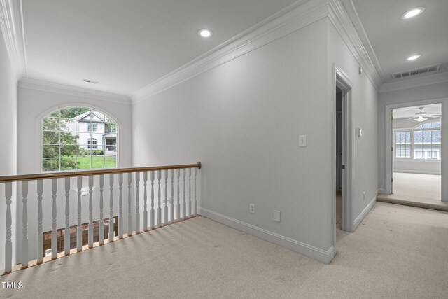 hallway featuring crown molding, carpet flooring, baseboards, and recessed lighting