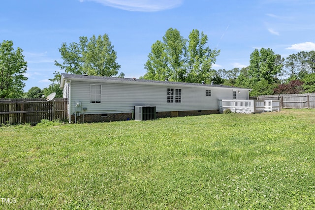 109 Winding Creek Dr, Youngsville, NC 27596 - back of property with central AC unit and crawl space