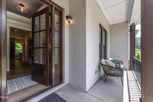 318 Ivy Ridge Rd, Chapel Hill, NC 27516 - doorway to property featuring a porch and brick siding