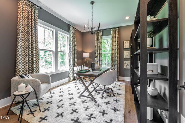 318 Ivy Ridge Rd, Chapel Hill, NC 27516 - office featuring baseboards, wood finished floors, a chandelier, crown molding, and recessed lighting