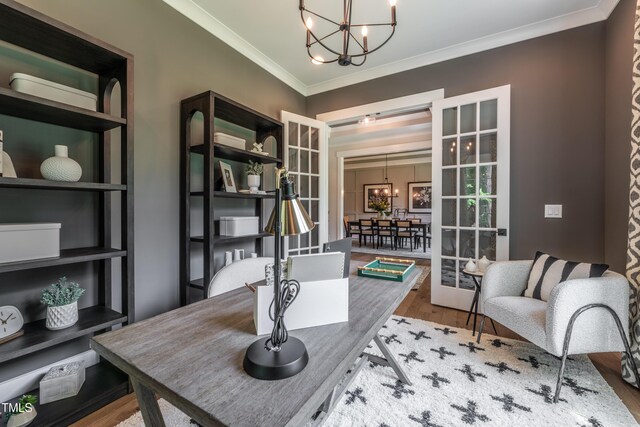 318 Ivy Ridge Rd, Chapel Hill, NC 27516 - home office featuring a chandelier, wood finished floors, and crown molding