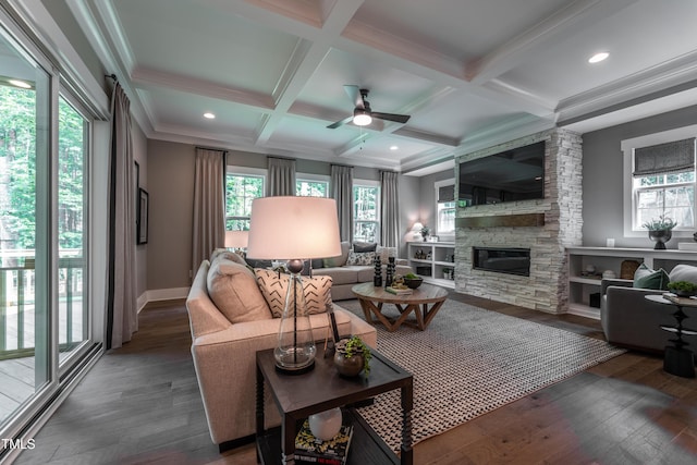 318 Ivy Ridge Rd, Chapel Hill, NC 27516 - living area featuring wood finished floors, a ceiling fan, a stone fireplace, beamed ceiling, and baseboards