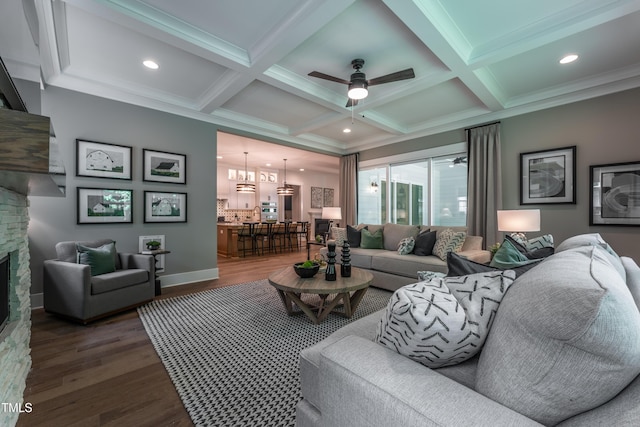 318 Ivy Ridge Rd, Chapel Hill, NC 27516 - living area with dark wood-style floors, ceiling fan, beam ceiling, coffered ceiling, and a stone fireplace