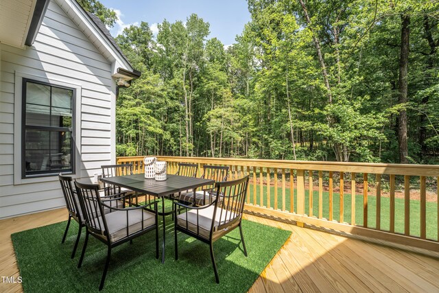 318 Ivy Ridge Rd, Chapel Hill, NC 27516 - wooden deck featuring outdoor dining area and a yard