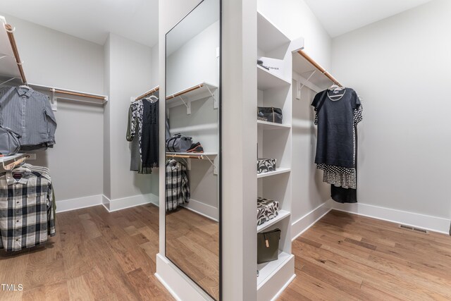 318 Ivy Ridge Rd, Chapel Hill, NC 27516 - spacious closet featuring wood finished floors