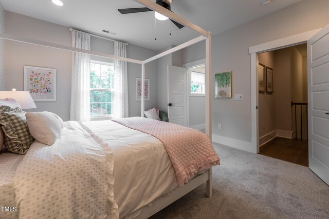 318 Ivy Ridge Rd, Chapel Hill, NC 27516 - bedroom with multiple windows, carpet, a ceiling fan, baseboards, and recessed lighting