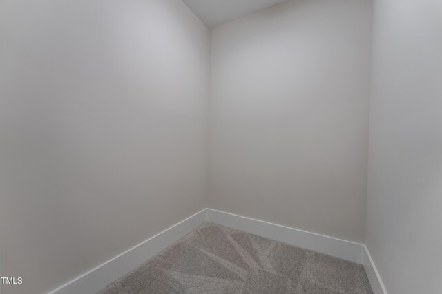 318 Ivy Ridge Rd, Chapel Hill, NC 27516 - carpeted empty room with baseboards