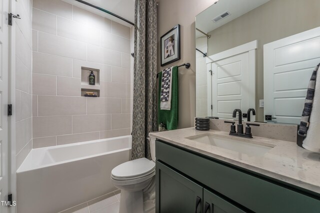 318 Ivy Ridge Rd, Chapel Hill, NC 27516 - bathroom featuring shower / tub combo with curtain, vanity, toilet, and tile patterned flooring