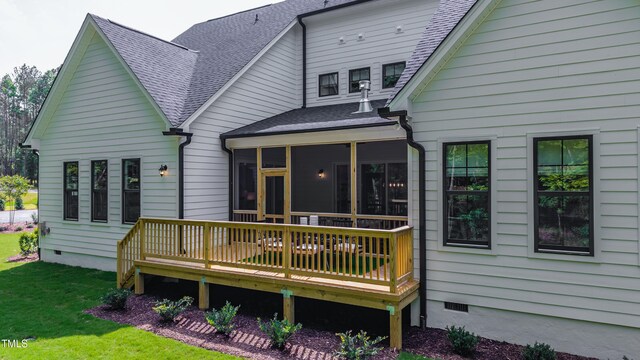 318 Ivy Ridge Rd, Chapel Hill, NC 27516 - back of house featuring roof with shingles, a wooden deck, crawl space, a sunroom, and a lawn