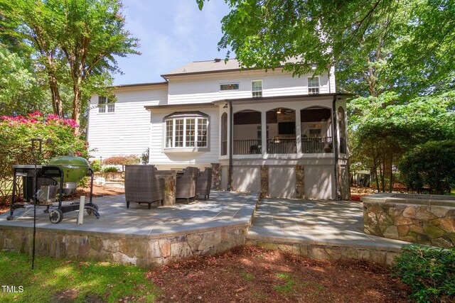 rear view of house with a patio area