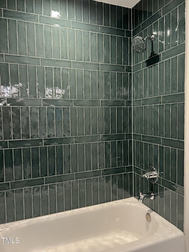 bathroom with shower / bathtub combination