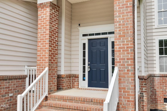 8820 Waynick Dr, Raleigh, NC 27617 - doorway to property with brick siding
